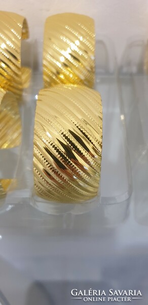 12 gold colored metal napkin rings