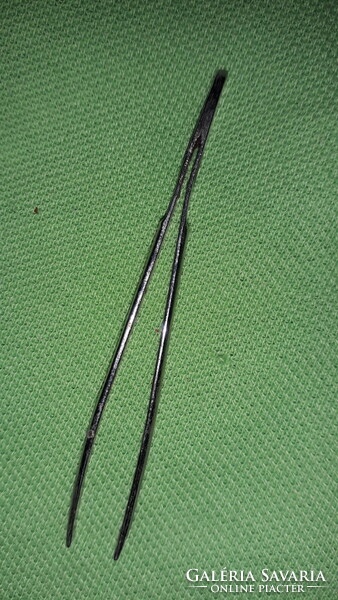 Old metal quality wilkinson cosmetic tweezers as shown in the pictures