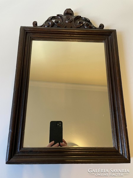 Carved wall mirror