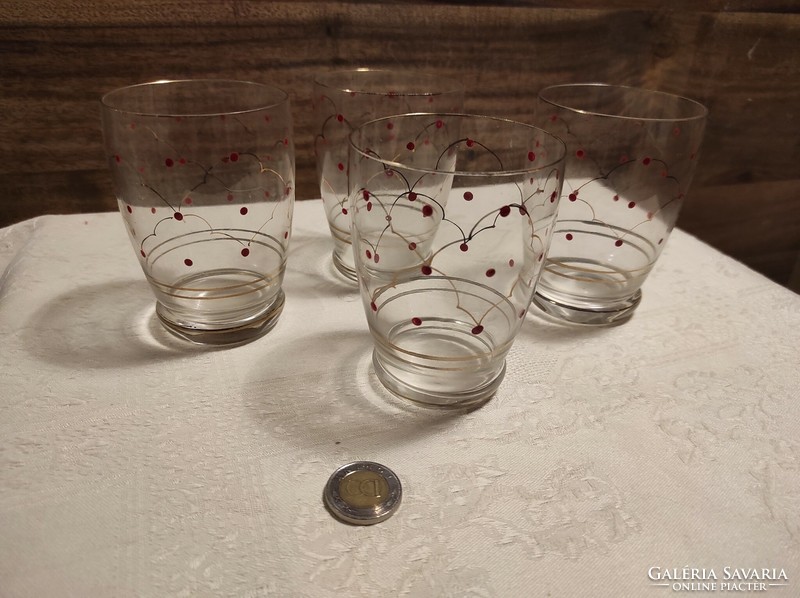 4 water glasses with polka dots