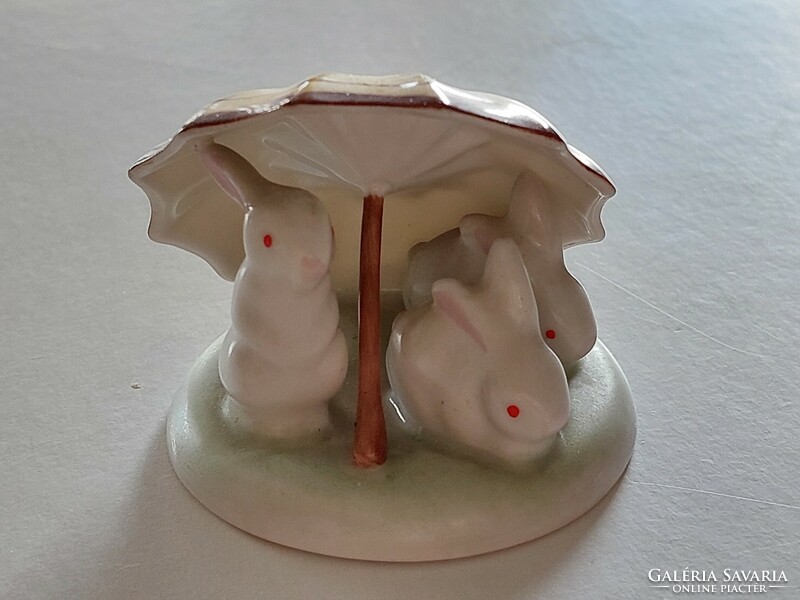 Old Hólloháza porcelain Easter bunny under a yellow umbrella