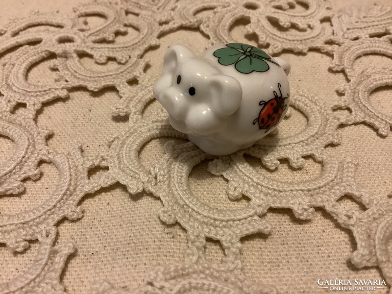 Miniature porcelain lucky pig figurine