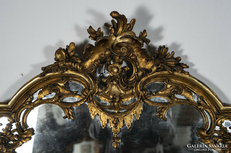 Gilded wood framed mirror with floral decor