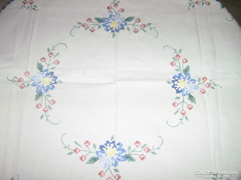 Tablecloth hand-embroidered with beautiful floral cross stitches