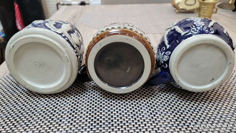 3 porcelain cups with tin lids. Bowling, soccer, tennis.