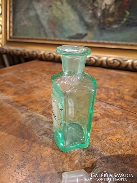 Apothecary glass colored in rare green material
