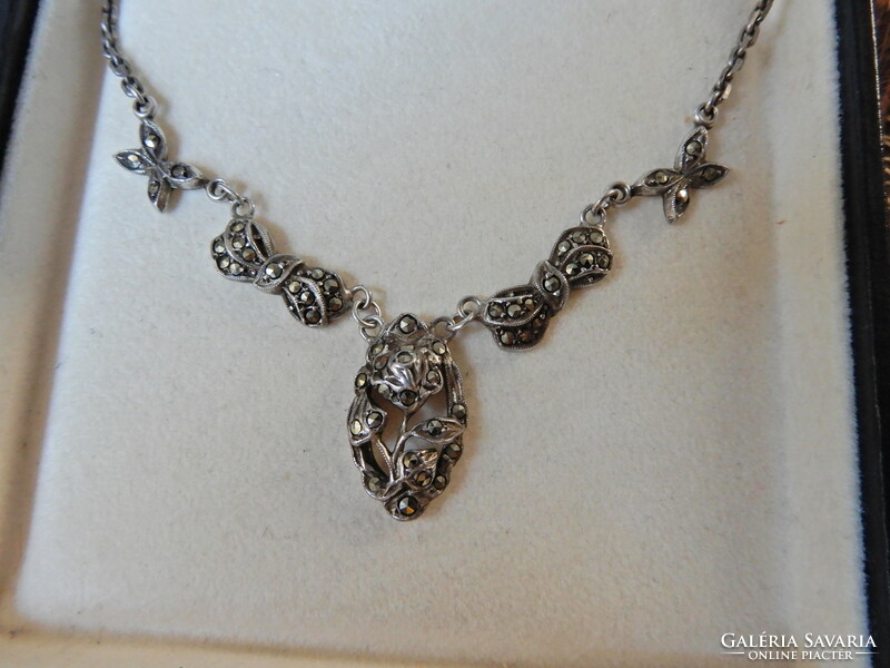 Old silver necklace with marcasite stones