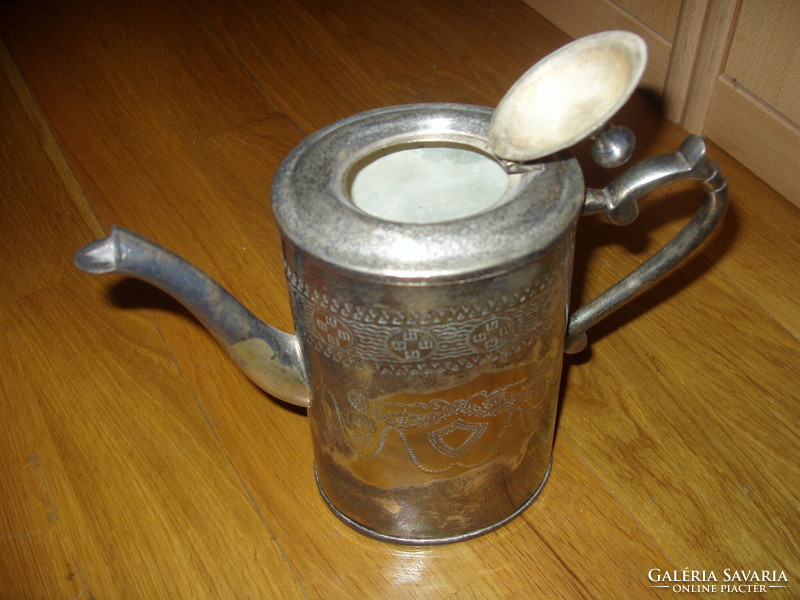 Old tea maker, spout. Unique manual work