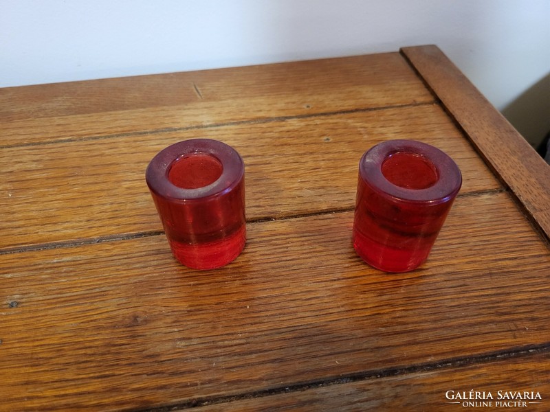 2 red glass candle holders