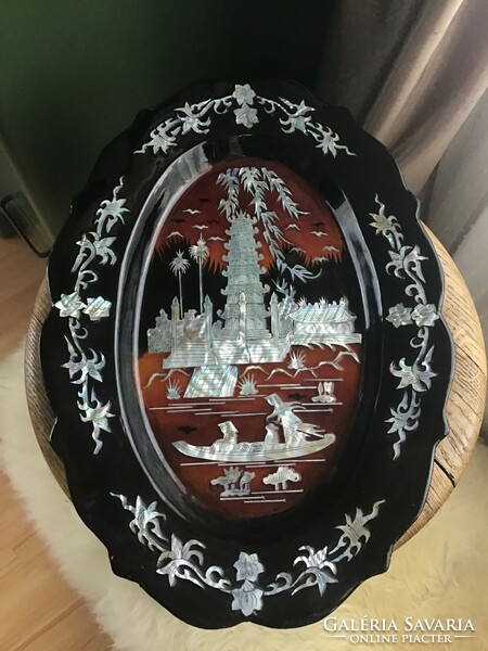 Lacquer wall plate decorated with peacock shells