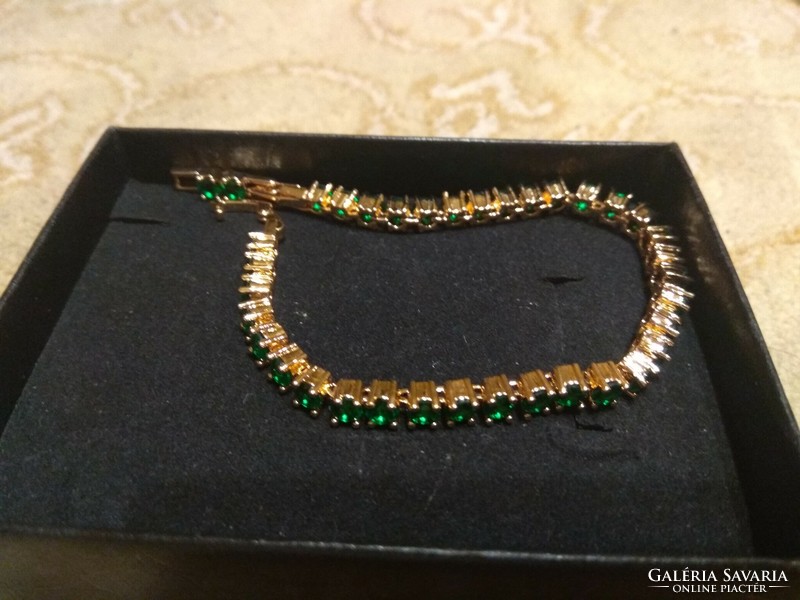 Silver, gold-plated bracelet with green jewels