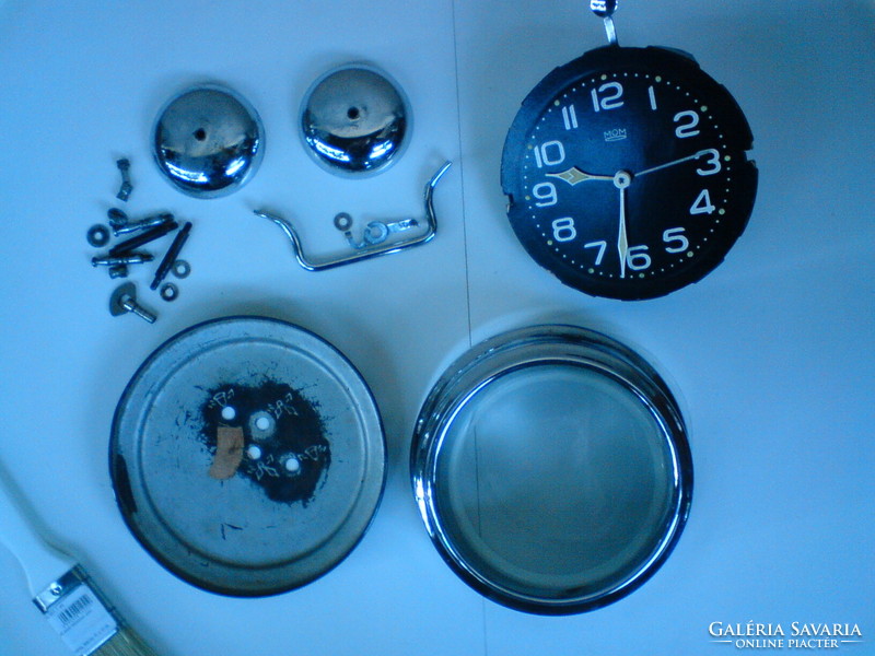 Old retro mom rattle clock disassembled