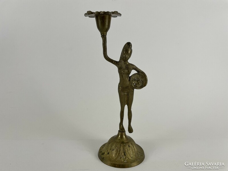 Copper candle holder in the shape of a female statue