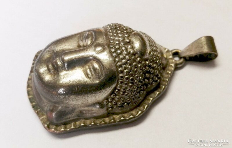 Antique Indian jewelry. Silver-plated buddha hollow pendant