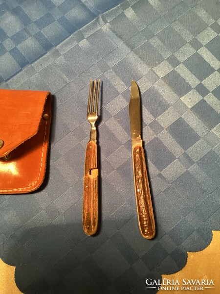Pocket knife with antler handle and fork in leather case.