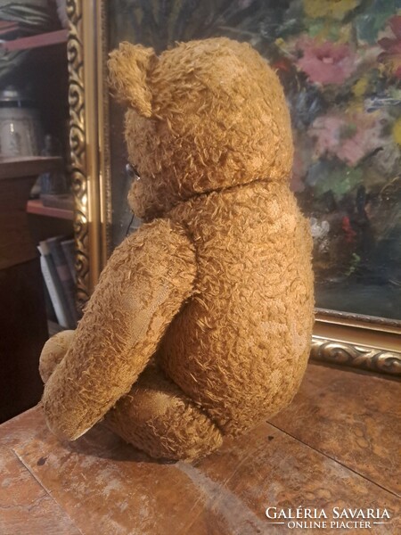 Antique straw teddy bear