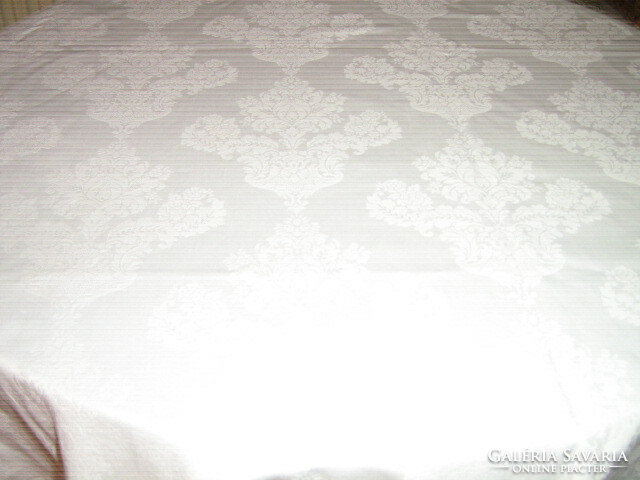 Beautiful damask tablecloth with white baroque flower pattern