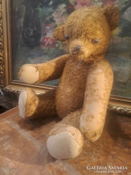 Antique straw teddy bear