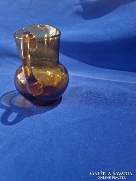 Amber colored small spout, jug