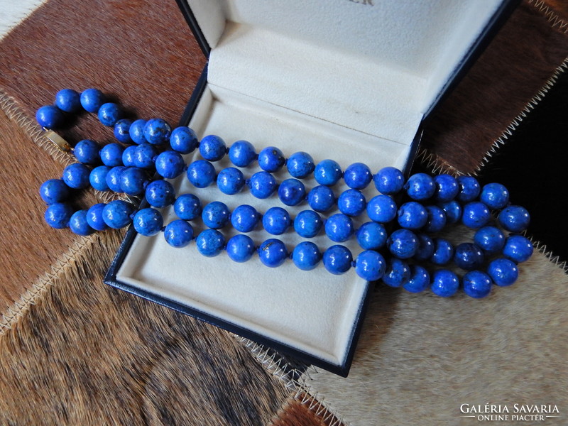An old, long string of lapis lazuli beads with a Chinese gold-plated clasp