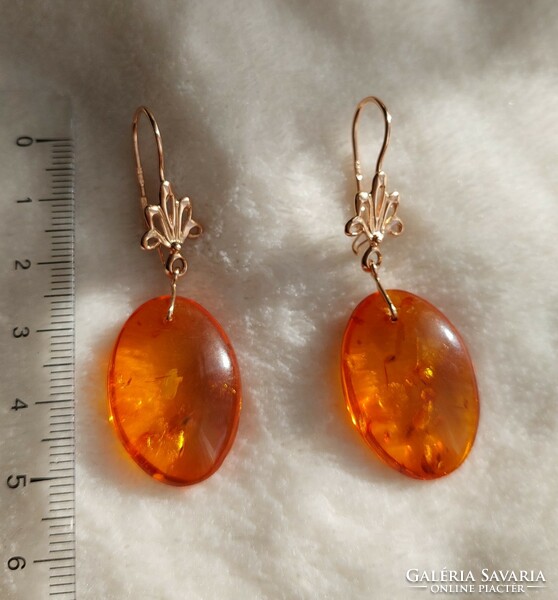 Classic gold earrings with amber