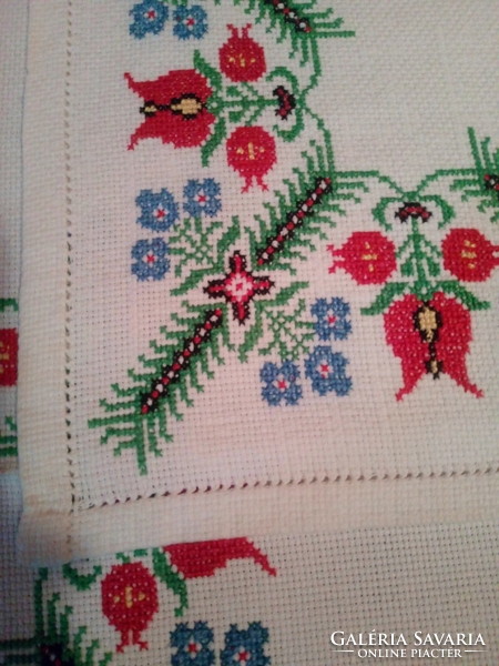 Antique cross stitch tablecloths.