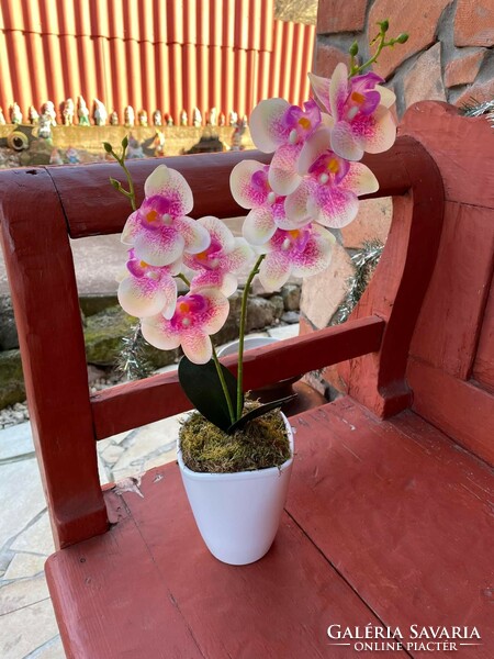 A beautiful maintenance-free orchid flower artificial plant in a ceramic pot