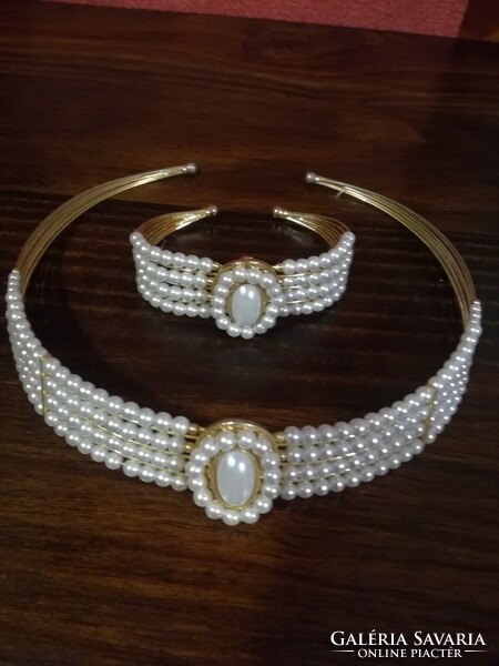 Unique white simulated 4 row pearl necklace with matching bracelet