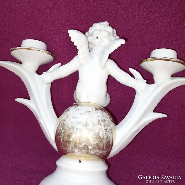 Old, winged putto, porcelain, table candle holder.