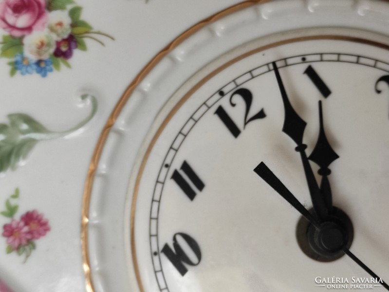 Porcelain vintage wall clock, hand-painted discreet small flower. Gönczi's legacy as a 
