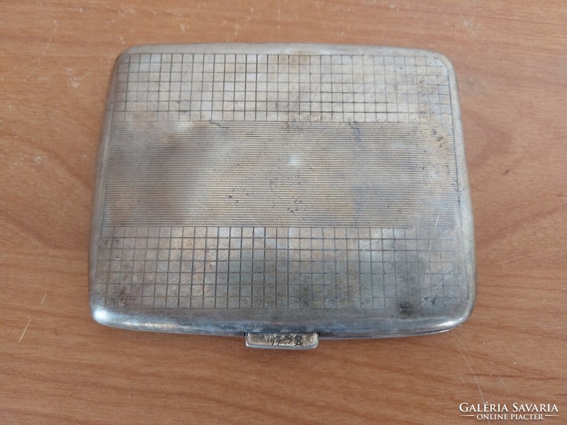 (K) old cigarette case with markings