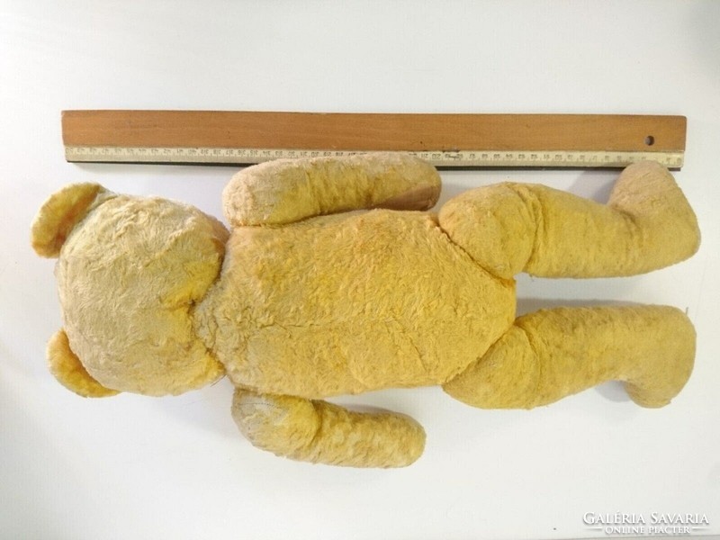 Teddy bear with a wooden base stuffed with old shavings, from around the 1960s