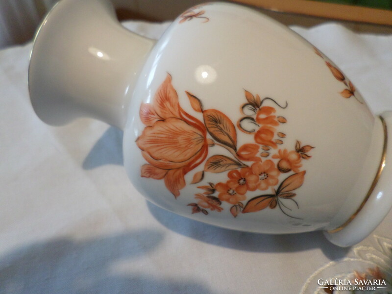 A very beautiful gilded porcelain vase with a flower pattern