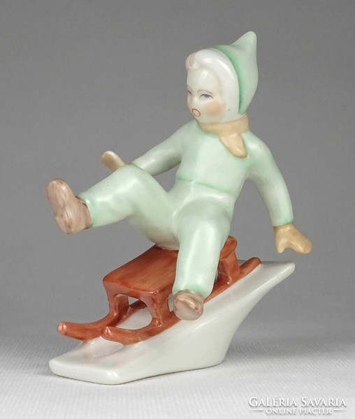 1Q307 old aquincum porcelain boy sledding