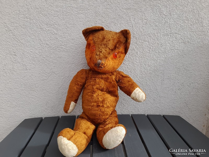 Stuffed antique brown teddy bear