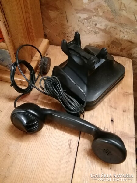 Black telephone with retro vinyl dial