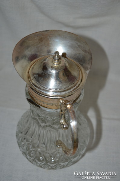 Molded glass pitcher with silver-plated fittings
