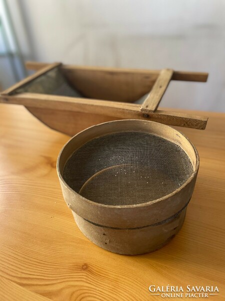 Antique wooden sieve and tomato strainer