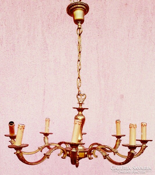 Antique bronze chandelier. Solid heavy piece with eight-ring candle burner