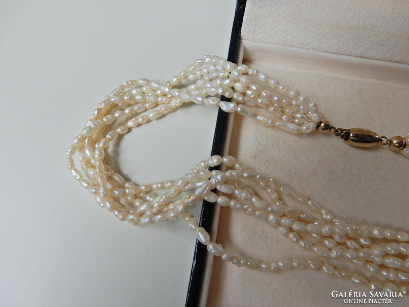Old 6-row cultured rice pearl string with 8 carat gold clasp