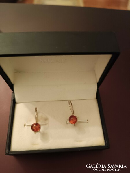 Old silver earrings with amber stones
