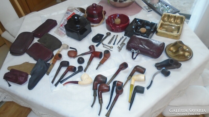 A collection of old pipes and the related tools together
