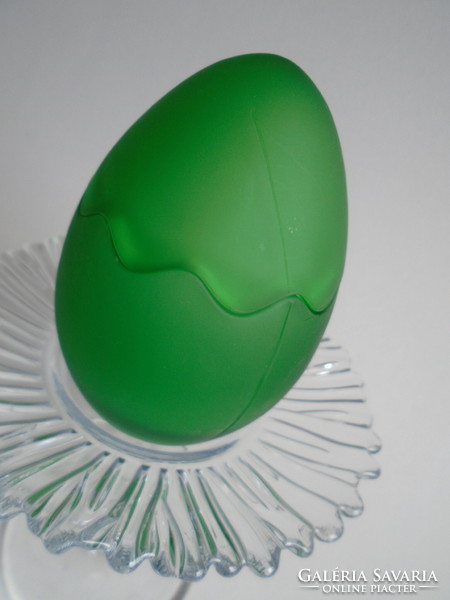 Thick green glass egg.