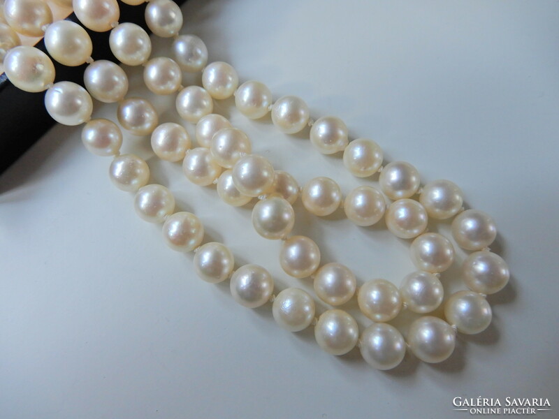 Two rows of genuine Akoya pearls with white gold clasp, sapphire stones and diamonds