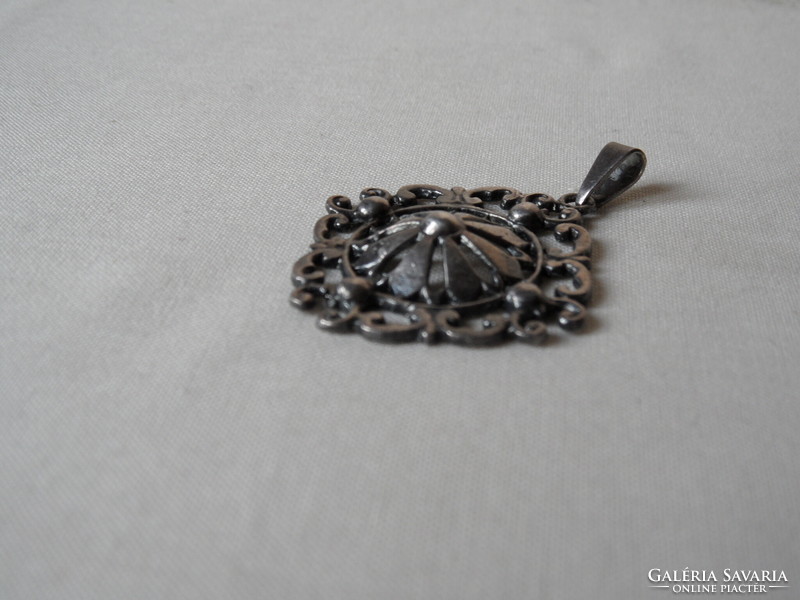 Old metal pendant