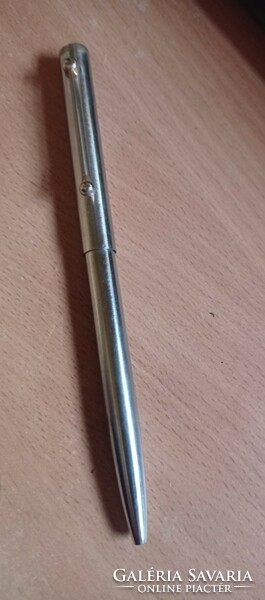 Old ballpoint pen with metal body..