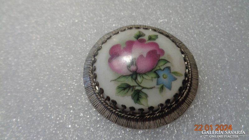 Pendant with porcelain insert, pink wild rose on it