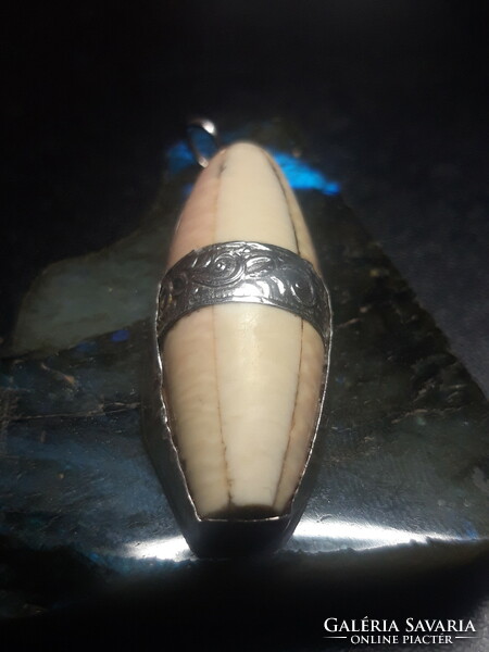 Silver pendant with antique bone inlay