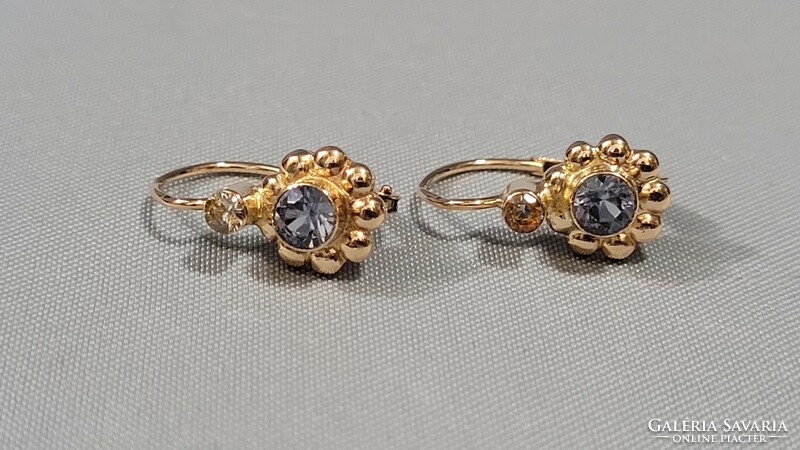 14 K gold women's earrings with pale blue stone 2.64 g