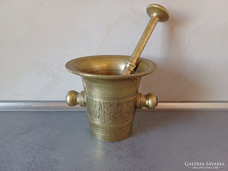 Old large copper mortar and pestle from the early 1900s